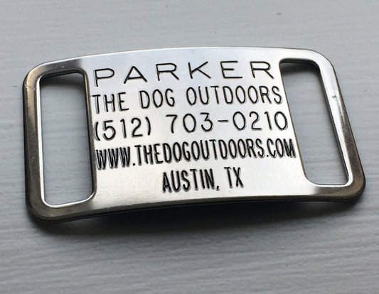 Stainless steel Boomerang Collartag Slide-On Dog ID tag with deeply engraved text. No jingle or snag. Guaranteed legiable for the life of your dog