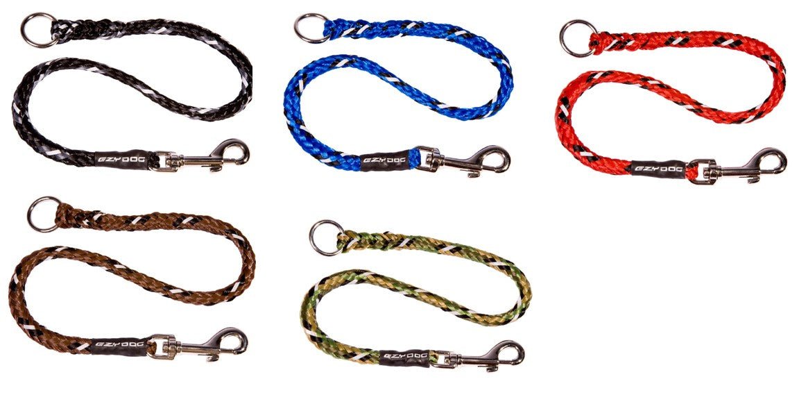 Five dog leashes in black, blue, red, brown, and camouflage colors.