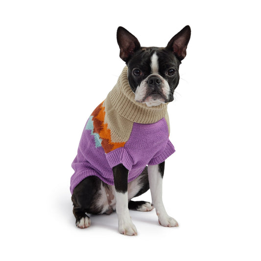 GF Pet Fireside Dog Sweater in Lavender and Clay – retro winter dog sweater with a soft purple lower body, beige upper section, and bold diamond knit pattern in burnt orange, golden amber, and sky blue; crafted in premium multi-knit fabric with ribbed turtleneck, sculpted unisex fit, and authentic GF Pet® logo patch; cozy vintage-inspired sweater for small, medium, and large dogs. purple orange oatmeal