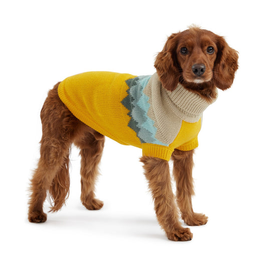 GF Pet Fireside Dog Sweater in Mustard Gold – vintage lodge-inspired winter dog sweater with a golden yellow lower body, sandstone beige top, and diamond knit pattern in layered shades of sky blue and charcoal gray; premium multi-knit fabric with ribbed turtleneck, sculpted unisex fit, and authentic GF Pet® logo patch; cozy cold-weather sweater for small, medium, and large dogs.